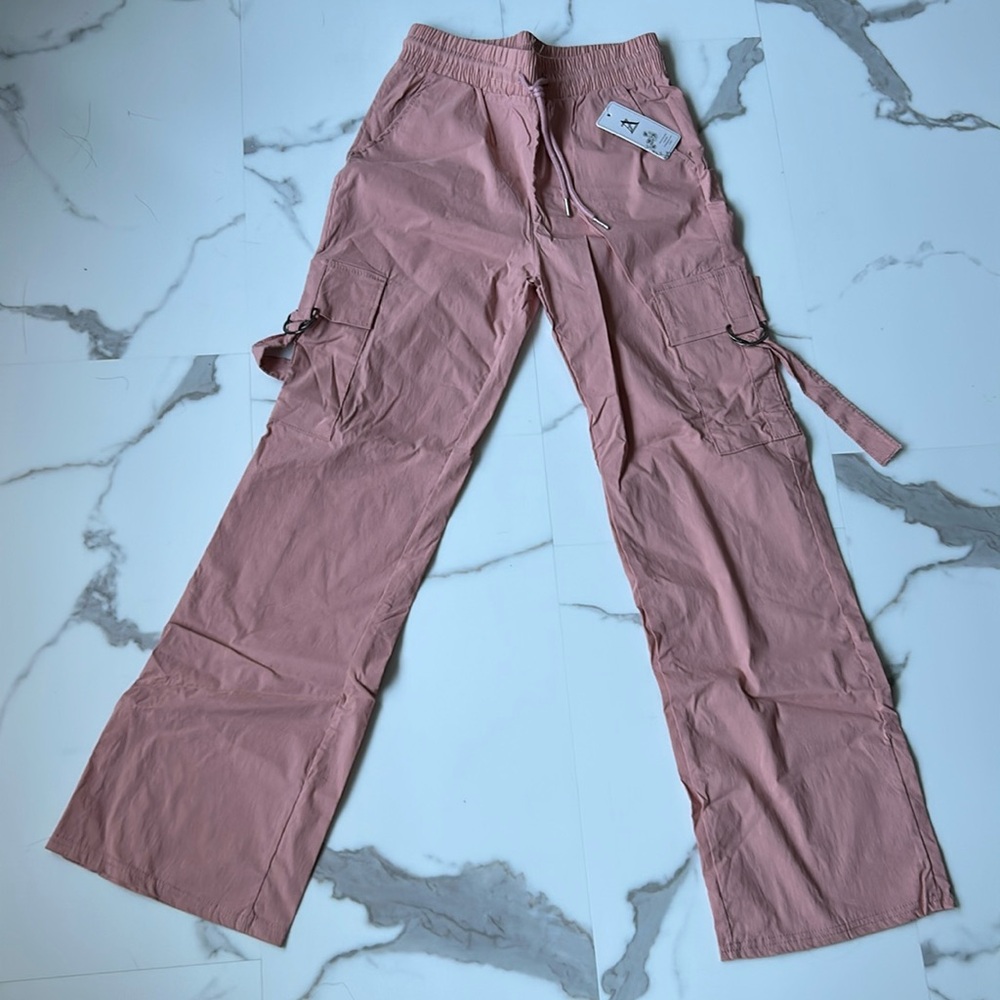 New with tags. Rose colored lightweight cargo wide leg pant. Elastic waist.